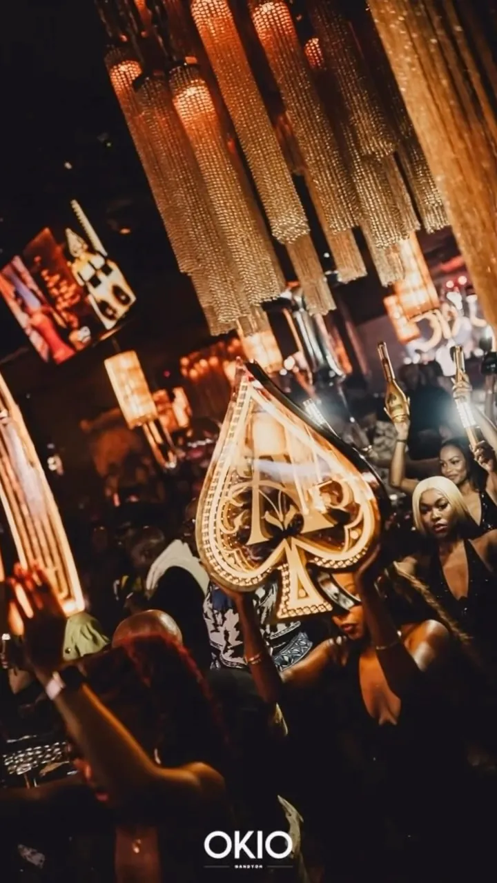Ace of Spades boards under the chandeliers